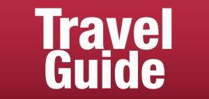 Travel Guide Schrift auf rotem Hintergrund